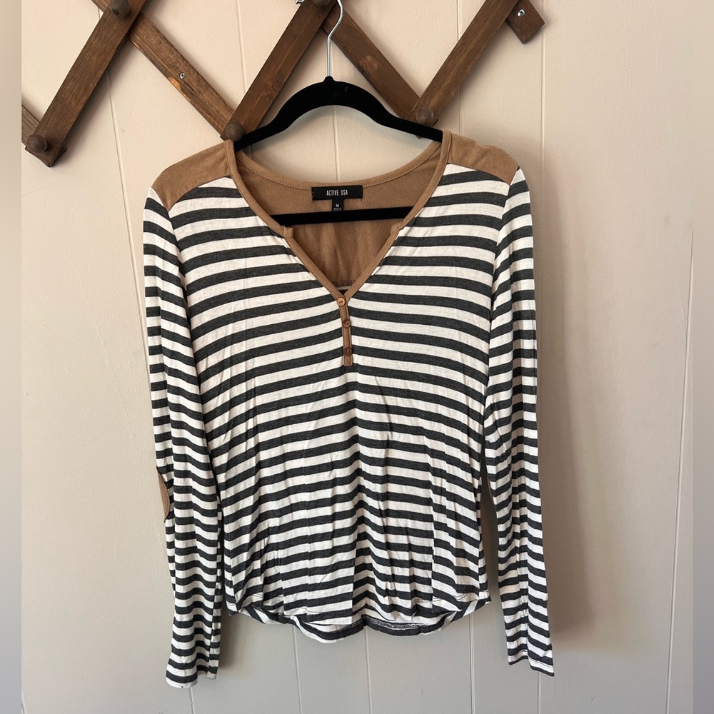 Black striped white and grey top; faux leather elbow pads and neckline